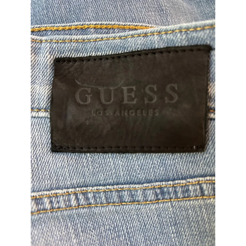 F13. Men’s Guess Denim Jeans, Light Wash, Factory Distressed, Slim Tapered, 38